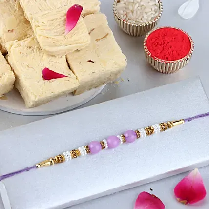 Sneh Nityam Creation Regular Ethnic Pearl Rakhi Soan Papdi: Rakhi Same Day Delivery