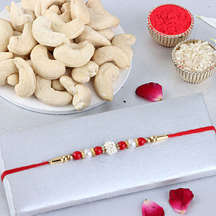 Sneh Nityam Creation Regular Ethnic Pearl Rakhi with Cashews: 