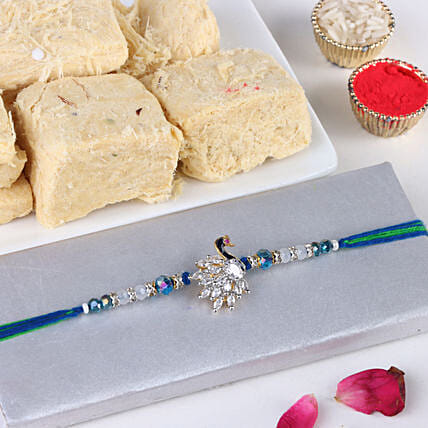 Sneh Shree Regular Ethnic Peacock Rakhi with Soan Papdi: Rakhi With Sweets