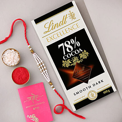 Sneh White Pearl Bead Rakhi with Lindt Extra Creamy Milk Chocolate: Rakhi Combos