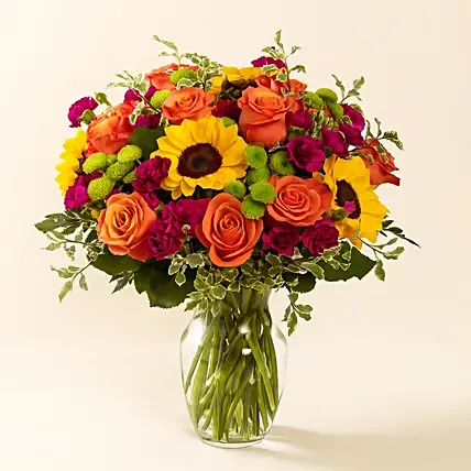 Vibrant Mixed Flowers Glass Vase: Anniversary Flowers Singapore