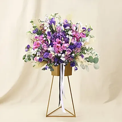 Mesmerising Purple & Pink Flowers Tripod Stand: Congratulatory Flower Stands