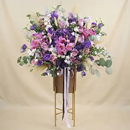 Mesmerising Purple & Pink Flowers Tripod Stand: Congratulatory Flower Stands