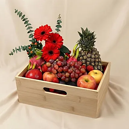 Mixed Red Flowers & Assorted Fruits Oval Basket: Wellness Hampers
