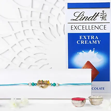 Divine Krishna Flute Rakhi with Lindt Chocolate: 