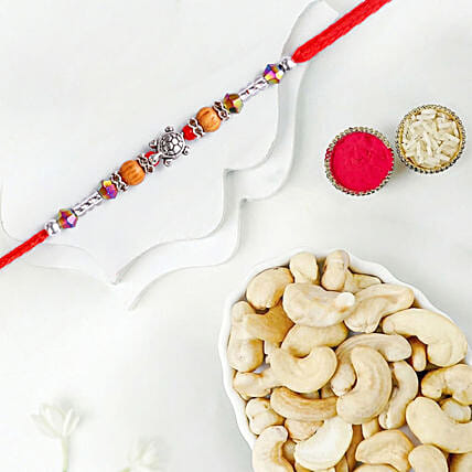 Sneh Striking Feng Shui Turtle Rakhi with Cashews: Rakhi Gifts