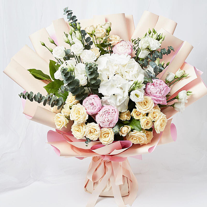 Ravishing Mixed Flowers Wrapped Bouquet