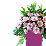 Elegant Pink Flowers Arrangement In Pink Stand