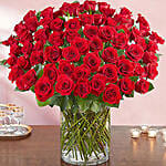 Ravishing 100 Red Roses In Glass Vase