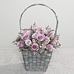 Purple Flowers In Rustic Handle Basket