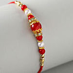 Set of Three Pearl Rakhis And Snickers