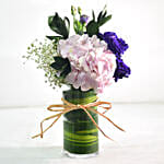 Beautiful Mixed Flowers In Round Glass Vase