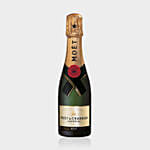 10 Sweet Tulips In Glass Vase With Moet and Chandon