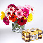 Elegant Gerberas In Glass Vase with Ferrero Rocher