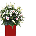 Lovely Mixed Flowers Red Stand Arrangement