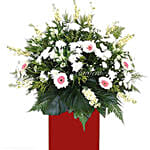 Lovely Mixed Flowers Red Stand Arrangement