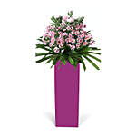 Lovely Pink Flowers Arrangement In Pink Stand