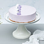 Lavender Cream Cake With White Orchid Plant