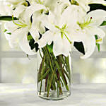 Serene Arranagement Of White Lilies With Birthday Balloons