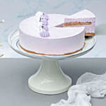 Lavender Earl Cream Cake With Birthday Candles