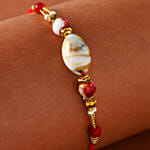 Zamia Plant With Designer Shell Rakhi