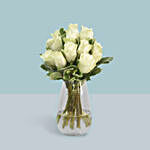 White Roses Arrangement In A Glass Vase
