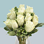 White Roses Arrangement In A Glass Vase