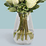 White Roses Arrangement In A Glass Vase
