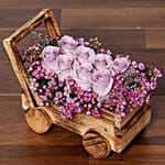 Purple Roses Beautifully Arranged In Cart