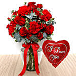 Red Flowers In Glass Vase With I Love You Balloon For Valentines