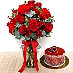 Red Flowers In Glass Vase With Mini Mousse Cake For Valentines