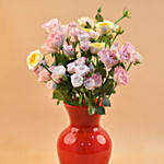 Mixed Spray Roses In Oval Shaped Red Vase