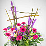 Alluring Mixed Flowers Green Cardboard Stand