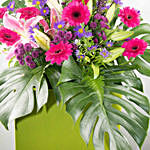 Alluring Mixed Flowers Green Cardboard Stand
