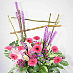 Alluring Mixed Flowers Purple Cardboard Stand