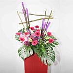Alluring Mixed Flowers Red Cardboard Stand