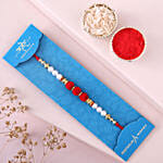 Sneh White Pearls Rakhi & Sweets Tin