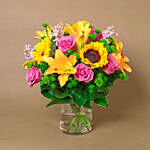 Sparkling Bunch of Flowers In Glass Vase