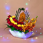 Colourful Flowers N Ganesha Idol Ship Shaped Vase