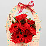 Red Gerberas In FNP Love Sleeve