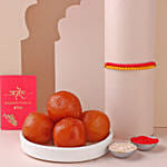 Sneh Red and Yellow Bead Rakhi with Gulab Jamun