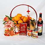 Basket of Oranges and Treats for New year