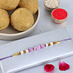 Sneh Nityam Creation Regular Ethnic Pearl Rakhi with Besan Laddoo