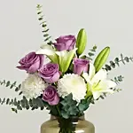 Lovely Mixed Flowers Oval Shaped Vase
