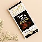 Sneh White Pearl Bead Rakhi with Lindt Extra Creamy Milk Chocolate