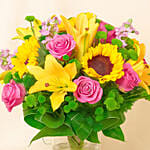 Sparkling Bunch of Flowers In Glass Vase