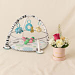 Round Game Mat With Toys and Balls With A Floral Arrangement