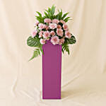 Elegant Pink Flowers Arrangement In Pink Stand