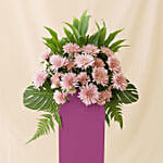 Elegant Pink Flowers Arrangement In Pink Stand