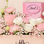Charming Pink Basket with Flowers, Lindt Chocolates & Candle